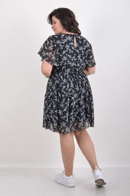 A everyday summer dress with a chiffon. The flower is black.495278311 495278311 photo