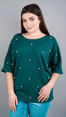 Una blusa elegante para mujeres talla grande. Emerald.485131361 485131361 photo