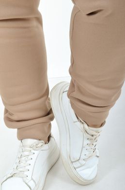 Sports costume on fleece pants with a cuff. Beige.495278339 495278339 photo