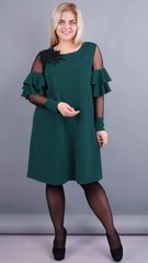 Ein elegantes Damenkleid in Übergröße. Emerald.4851312775052 4851312775052 photo