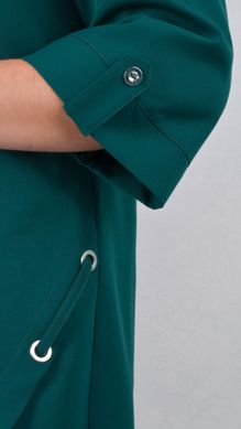 An elegant dress for curvy women. Emerald.485140226 485140226 photo