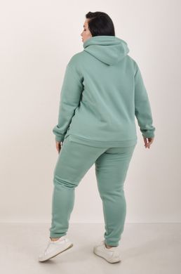 Sports costume on fleece pants with a cuff. Mint color.495278336 495278336 photo